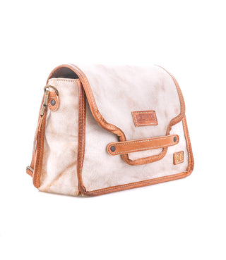 White crossbody bag with orange accents on a white background